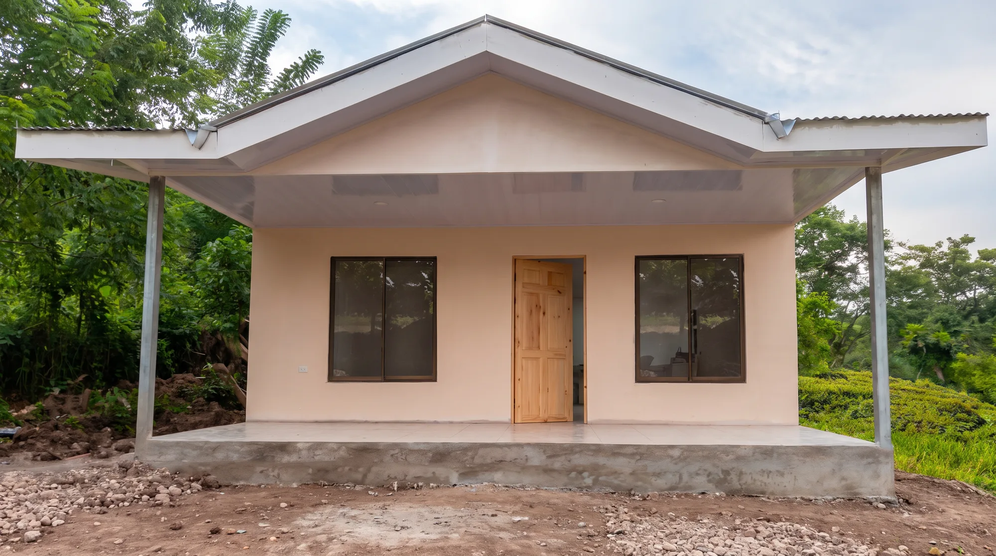 Fachada casa crema — 8 Casas Cobano