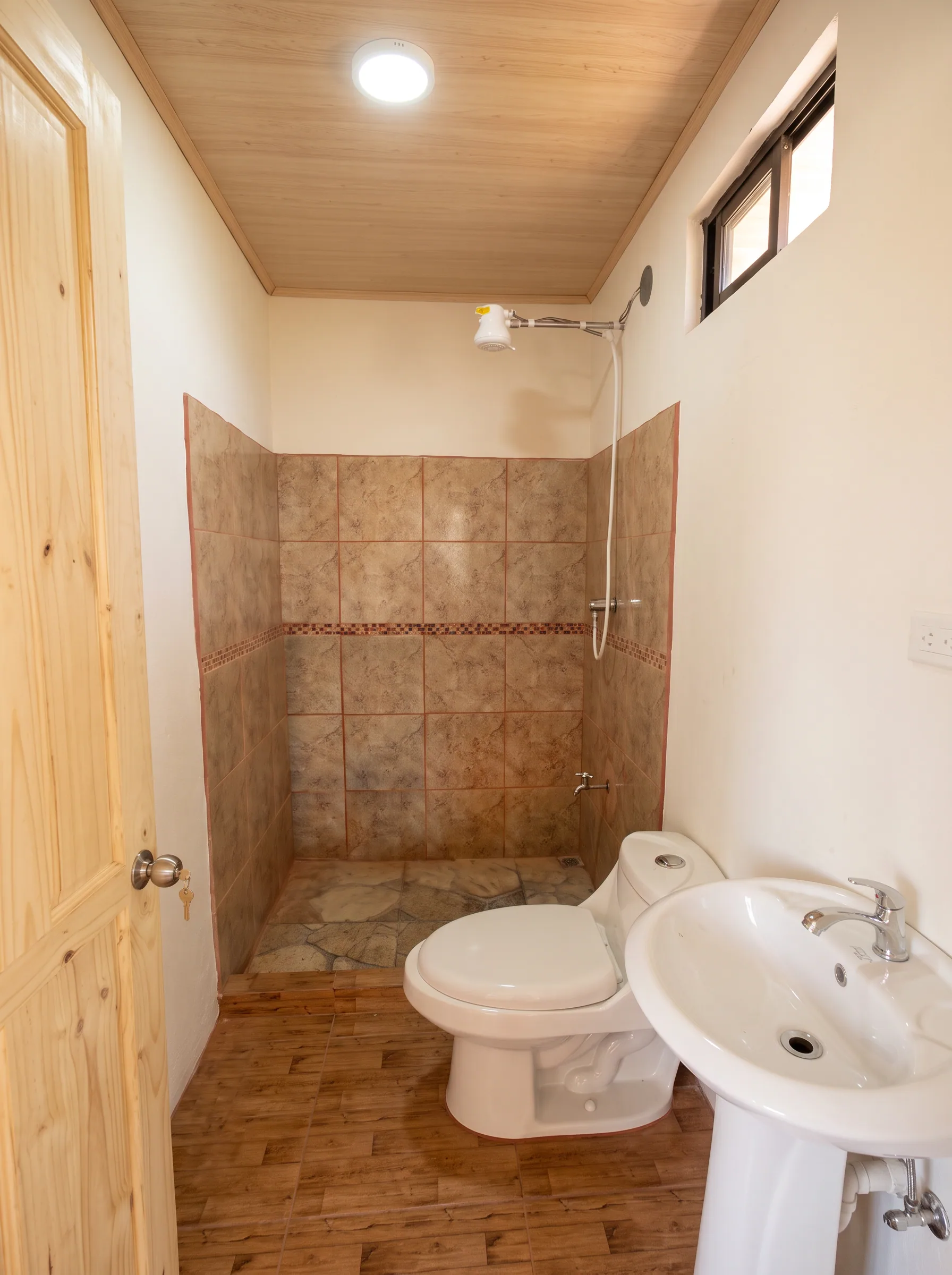 Baño — Casa Naranjo 67m²